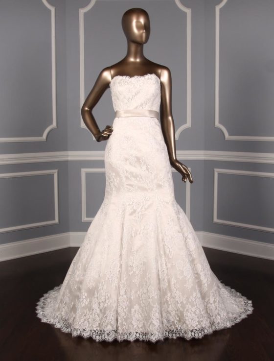 This Allure Bridal 9117 wedding dress is Brand New and has its hang tag attached!  The gown can be worn strapless, or if you like you can add the included spaghetti straps.  Either way, the gown is gorgeous and comfortable to wear for hours and hours.  The champagne lining shows through the ivory lace giving the Allure wedding gown a soft touch of color.  This wedding dress is strapless with a luxurious champagne satin sash at the waist, a trumpet silhouette and a chapel train.  If you prefer, the champagne sash can be removed.