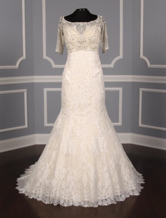 This Allure Bridal C341 wedding dress is Brand New and has its hang tag attached!  The workmanship on this gown is amazing in person!  The beading and embroidery on the bodice are out of this world!  Luxurious lace creates the fit and flare design of this Allure wedding gown.  The light gold lining shows through giving the gown a soft touch of color.  There are sheer short sleeves, a sheer back, an empire waist and a trumpet silhouette that flows into a chapel train.