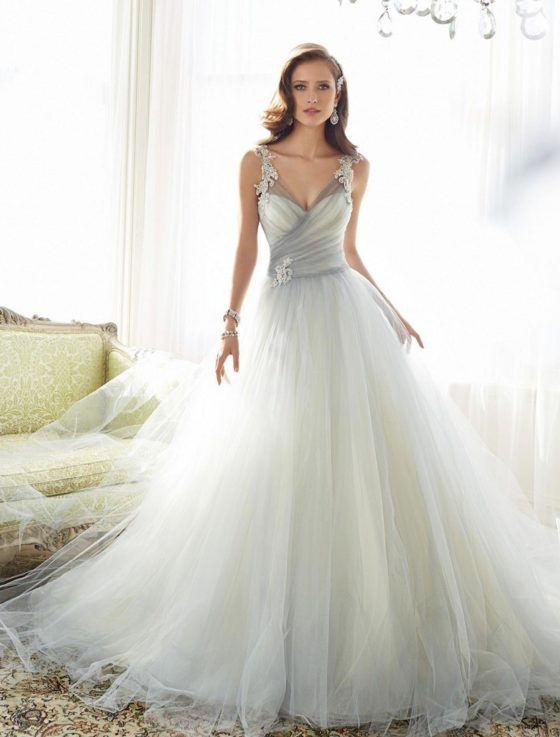 This Sophia Tolli Y11550 wedding dress is Brand New and has its Sophia Tolli hang tag attached!  The gown is incredible in person!  It is made from a misty gray color tulle with a dotted swiss tulle underlay.  So gorgeous and unique!  This ballgown wedding gown is sleeveless with a sweetheart neckline and a chapel train.  You will feel like a princess when you walk down the aisle in this stunning Sophia Tolli wedding dress.