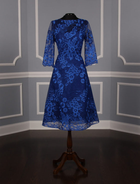 This beautiful Liancarlo 7202 X dress is Brand New! A perfect dress for many occasions! You can wear this dress to your wedding, a cocktail party, formal event or as a bridesmaid dress. It is also perfect for a mother of the bride or groom. It is made from gorgeous embroidered tulle. This 3/4 length sleeve dress has a jewel neckline, an a-line silhouette and is knee length.